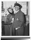 Frank Armstrong and woman wearing antlers